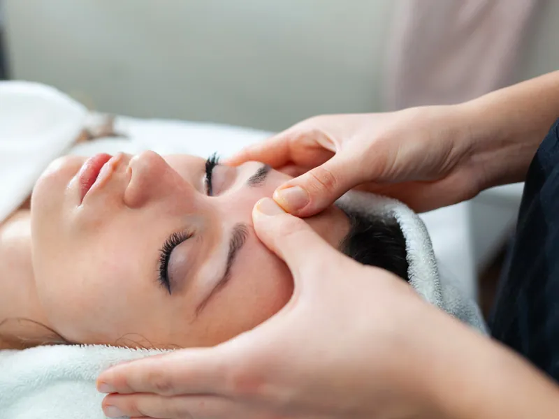 Guest receiving a facial treatment