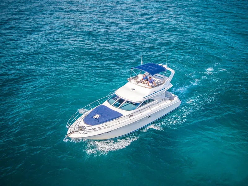 Aerial view of the Sea Ray 42 flybridge yacht cruising over deep turquoise Caribbean water