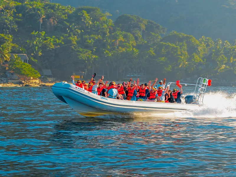 Speedboat full of guests racing across Banderas Bay
