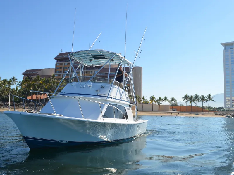 Sport-fishing boat with a tuna tower in Marina Vallarta