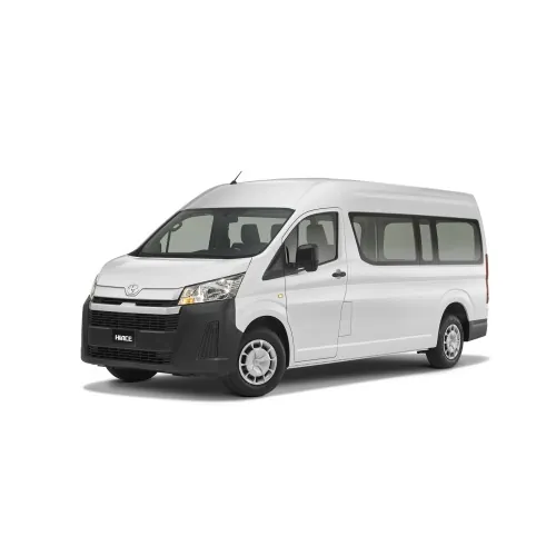 A white Toyota Hiace high-roof van available with a driver by the hour on the Riviera Maya