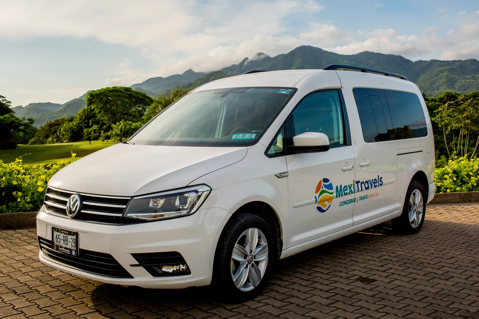 White Volkswagen Caddy for small-party transfers