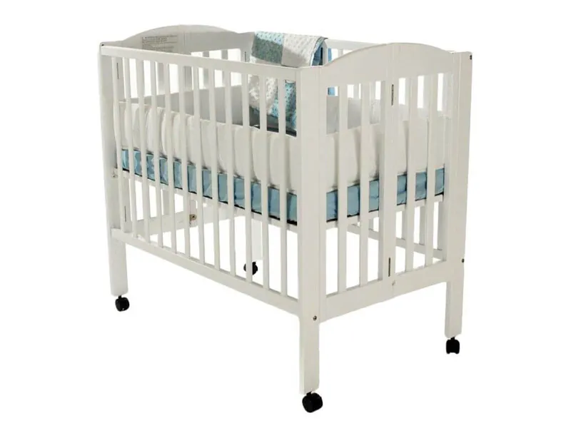 White wooden full-size baby crib